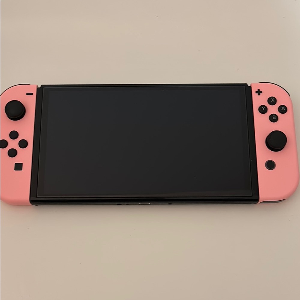 Nintendo Handheld Console Pink and Black